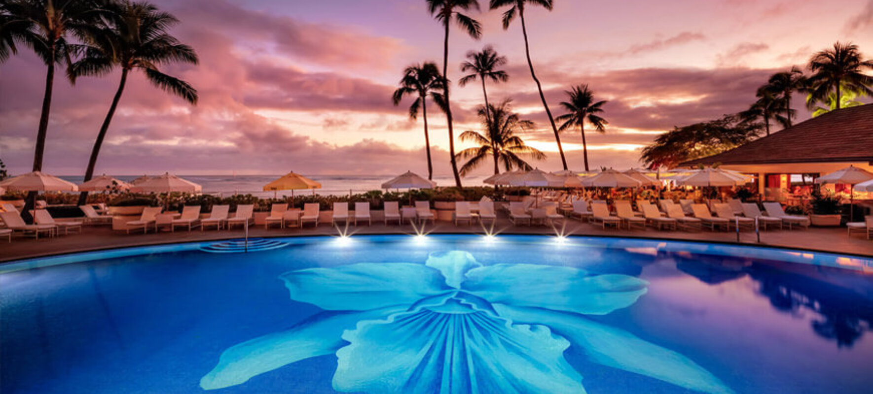 Halekulani Pool view at Sunset overlooking Waikiki Beach