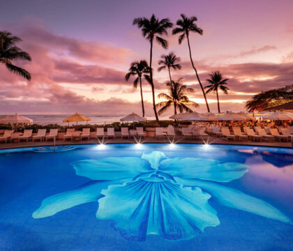 Halekulani Pool view at Sunset overlooking Waikiki Beach